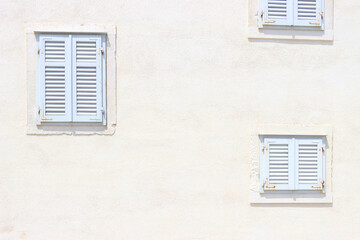 Traditional Mediterranean window in white on white background.
