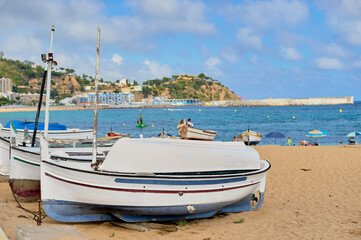Naklejka na ściany i meble View of Blanes beach with boats in the foreground