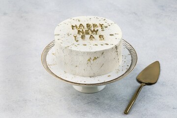 Christmas cake on white cake stand. Copy space.