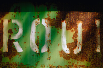 Rusty metal background, texture. Iron background - wall of an old rusty freight car, green in color...