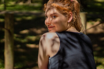 Smiling young girl in urban area