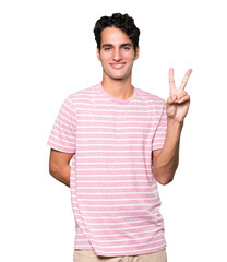 Naklejka premium Young man making a number two gesture