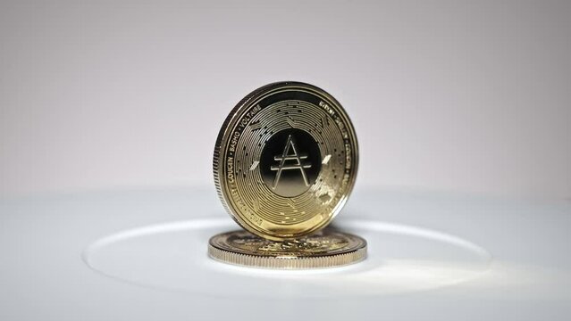 cardano coin rotating on white background