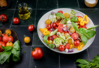fresh vegetable salad on dark background