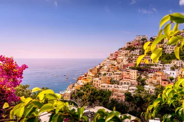 Photo sur Plexiglas Plage de Positano, côte amalfitaine, Italie Positano, Italy - July 17, 2021: View of Positano village along Amalfi Coast in Italy