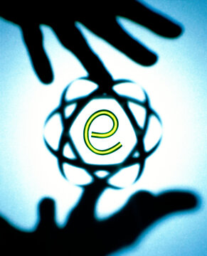 Silhouette of human hands with the letter E between the fingertips