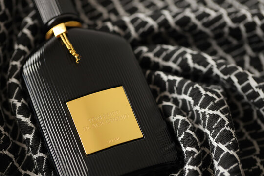 TERNOPIL, UKRAINE - SEPTEMBER 2, 2022 Tom Ford Black Orchid Unisex Perfume Bottle On Plaid In Monochrome Colors