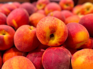 Fototapeta na wymiar Display of fresh Georgia peaches