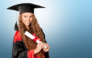 Pretty woman with graduate bechalor degree. Education successful university college woman smiling...