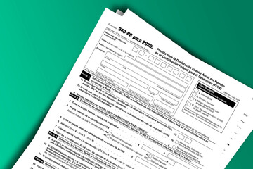 Obraz premium Form 940 (PR) documentation published IRS USA 43902. American tax document on colored