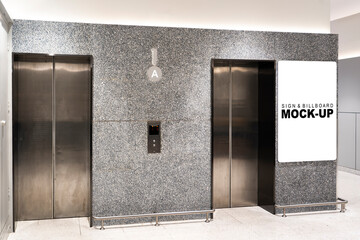 Mockup advertising billboard at front of elevator in building © pixs4u