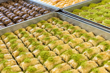 Turkish and Middle Eastern dessert, Local name: Baklava.  Pistachio dough desserts in the tray