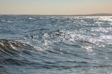 water sparkles at the beach