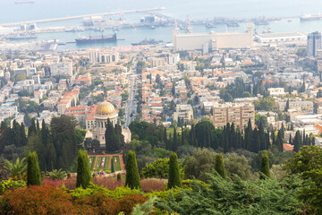 Haifa, Israel, June 26, 2022 : view from Louis Promenade on Mount Carmel to the Bahai Temple, the downtown and port of Haifa city in Israel
