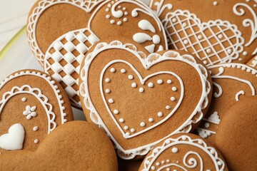 Tasty heart shaped gingerbread cookies, closeup view