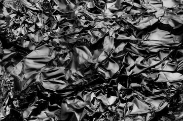 metallic crumpled aluminium foil textured background chrome tinfoil abstract