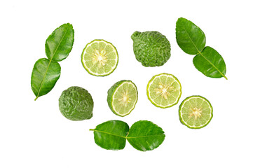 Kaffir fruits with half and leaves on  white background. top view
