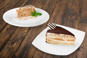 Composition with assorted cakes. Set of dessert. Pieces of cakes