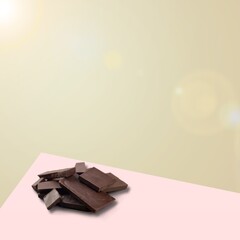 Milk chocolate on a background. Creative chocolate photography.