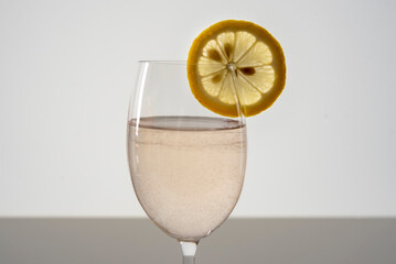 still life with glass and lemon