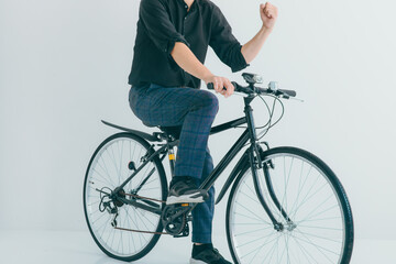 Fototapeta na wymiar 自転車にまたがる男性　bicycle