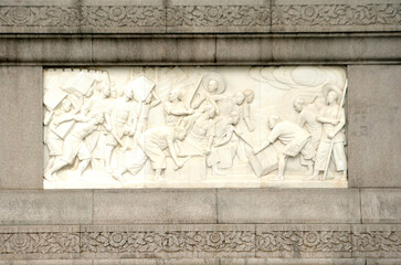 White marble relief on the base of the Monument to the People's Heroes at Tian 'anmen Square in Beijing, China