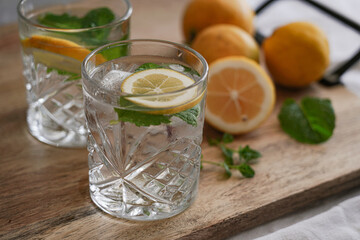glass of water with lemon and mint