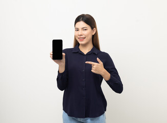 Fototapeta premium Pretty young mixed race woman using smartphone standing on isolated white background. She texting on cell phone. Feeling happy and excited