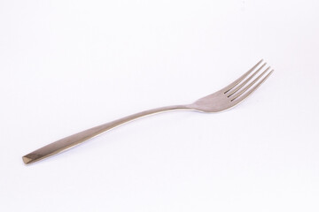 stainless steel fork on a white background