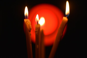 Wax candles in the dark
