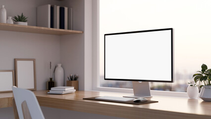 Minimal home office workplace interior with computer mockup on wood table, built in shelves. close-up