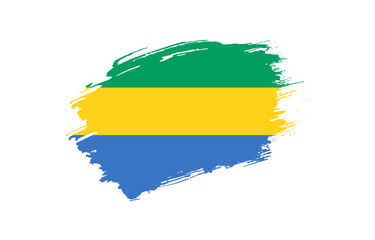 Obraz premium Creative hand drawn grunge brushed flag of Gabon with solid background
