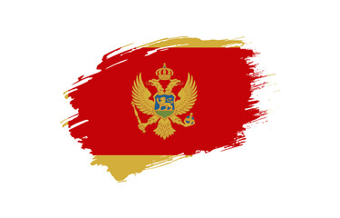 Creative hand drawn grunge brushed flag of Montenegro with solid background