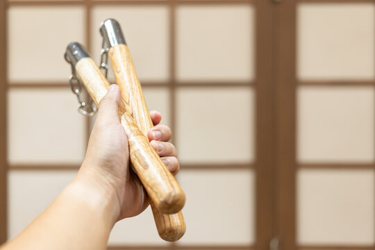 Nunchuks. Wood nunchuks with metal chain. Wooden nunchaku.