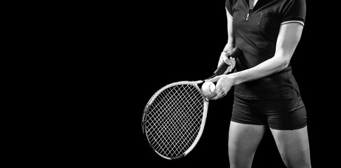 Midsection of woman holding tennis racket and ball