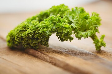 Parsley on wooden surface