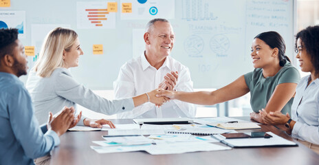 Handshake in meeting for business deal, welcome employee and support in corporate partnership while manager gives applause in celebration. Workers and collaboration team with motivation and thank you