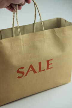 Cropped Hand Of Person Holding Brown Paper Bag, Paper Shopping Bag