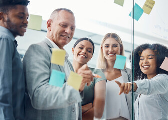 Innovation, planning and team collaboration with business people writing schedule and plan on...