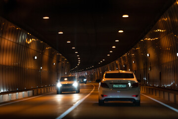 cars in the tunnel with beautiful lighting