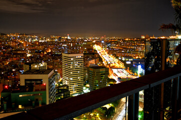Fototapeta na wymiar A night time long exposure view of the Barcelona sprain skyline.