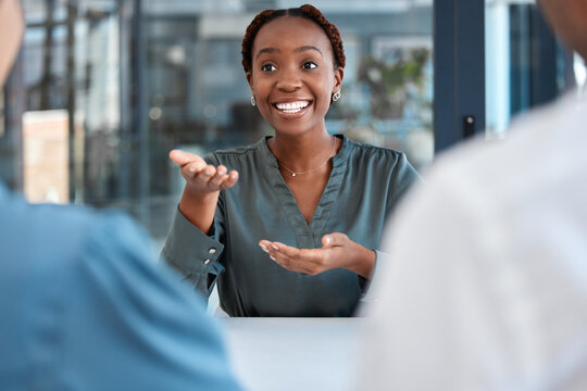 Black manager, advisor or coach during business meeting while talking, speaking and explaining strategy or vision in office. African american woman planning and discussing collaboration with her team