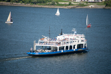 A ship sailing on the river