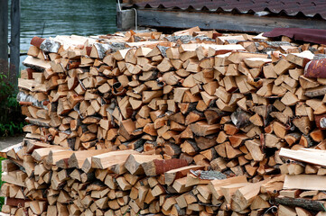 shed for storing firewood with dry firewood