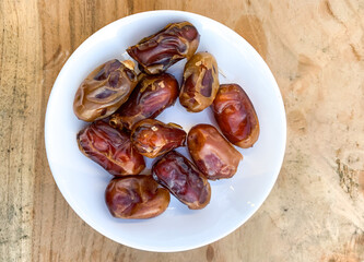 dates on a white plate.