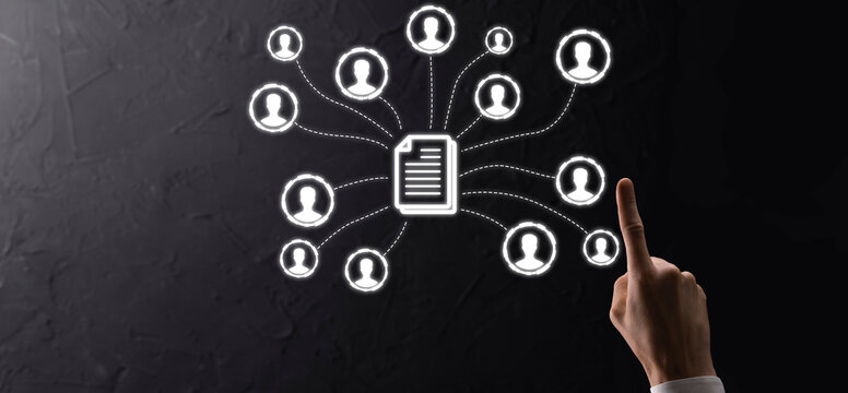 Man hold document and user icon.Corporate data management system DMS and document management system concept. Businessman click or publish on document connected with corporate users