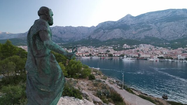 4k Footage of Croatian Port from behind Spomenik Sv Petra, Croatia
