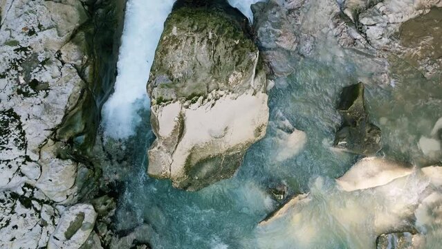 Rushing Turquoise Stream Flows Down From The Rocky Mountains In Martvili Canyon, Georgia. Aerial Drone Shot