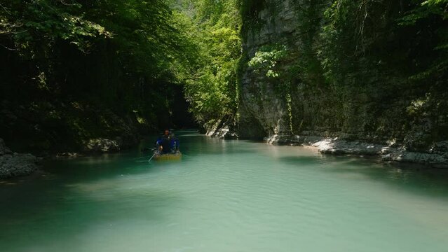 Martvili Canyon Expedition With Tourists Rafting In Rubber Boat Near Gachedili, Georgia. Tracking Shot