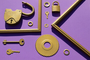 Circular saw blade, padlocks, keys, washers, fragments of frames on a lilac background